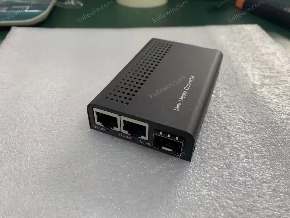 Mini 2x 10/100/1000Base-T RJ45 to 1x 1000Base-X SFP Slot Gigabit Ethernet Media Converter